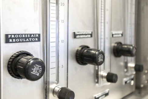 Precision process air regulator on an industrial spray dryer, showcasing the detailed controls of our advanced spray drying systems.