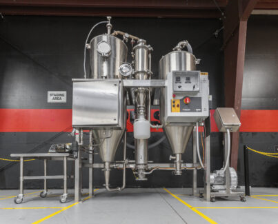 A compact industrial spray dryer system from Pulse Combustion Systems, an example of our high-performance spray drying equipment, assembled and ready in our staging area.