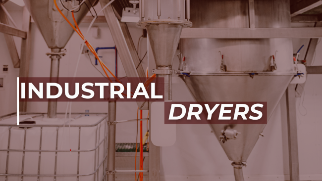 Industrial spray drying equipment with large conical metal hoppers and interconnected piping, featuring overlaid text 'INDUSTRIAL DRYERS'