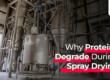 Banner with the text for Why proteins degrade during spray drying? with an industrial spray dryer on the background